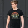 Man wearing a black 18 Years of Being Awesome T Shirt with a full-colour vintage-style 18th birthday graphic on the front