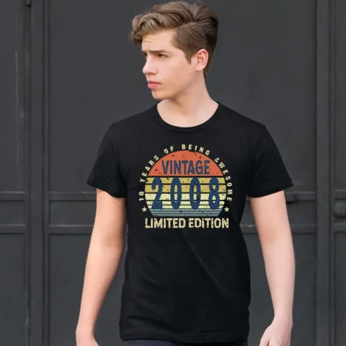 Man wearing a black 18 Years of Being Awesome T Shirt with a full-colour vintage-style 18th birthday graphic on the front