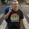 Middle-aged man wearing a black men’s 50th birthday T shirt with “50 Years of Being Awesome” design
