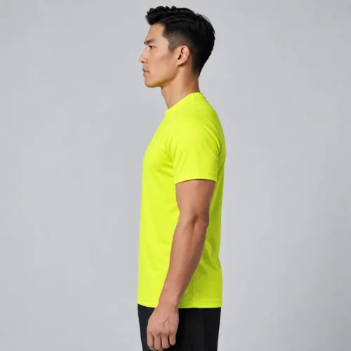 Left-side view of a man wearing the Bright Yellow Printer Activewear PA408 Men’s Run Active Tee.