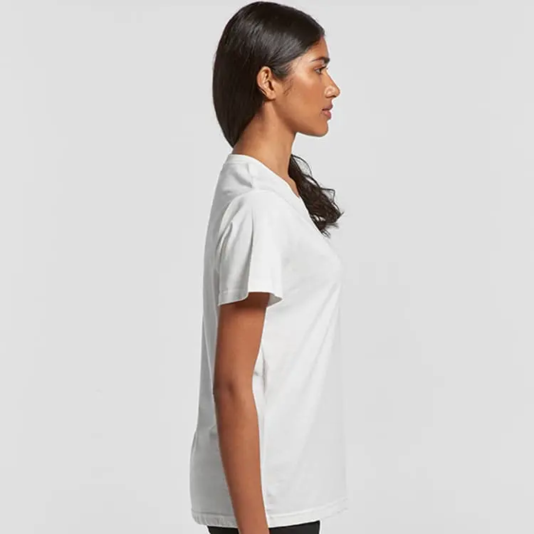 Side view of woman wearing AS Colour ladies basic tee in white, regular fit cotton t-shirt