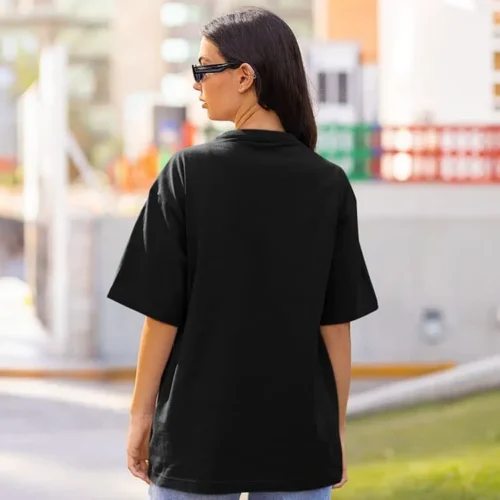 Black premium oversized custom tee worn lifestyle back view, oversized fit with dropped shoulders and smooth back panel