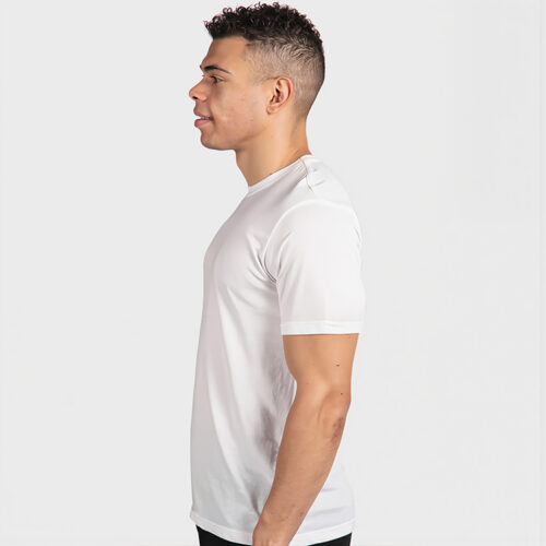 Next Level Men's Tri-Blend T Shirt in Heather White, lifestyle side view worn