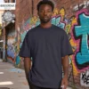 AS Colour Men's Heavy T Shirt in Midnight Blue with custom print, lifestyle view