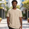 AS Colour Men's Staple T Shirt with custom print, Bone, lifestyle view • Title: AS Colour Men's Staple T Shirt – Custom Print – Bone – Lifestyle
