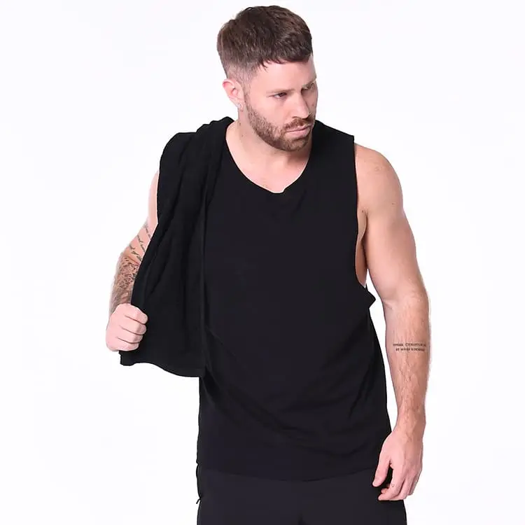 Blank Athletics Essential Gym Towel in Black, studio casual, towel over shoulder