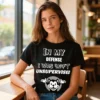 Ladies black In My Defense I Was Left Unsupervised t-shirt worn in a lifestyle photo