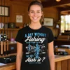 Woman wearing a distressed A Day Without Fishing black t-shirt in a tackle shop