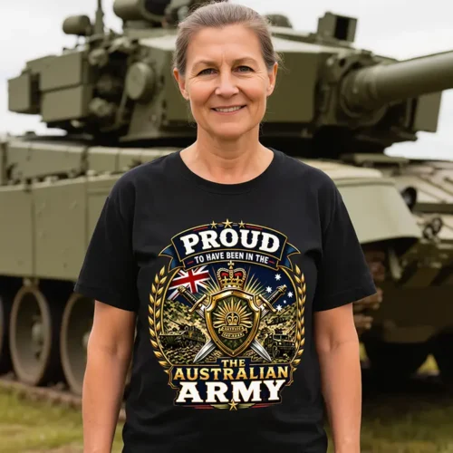 Woman wearing an Australian Army-inspired t-shirt in front of a tank