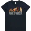 Evolution of a Man ladies t-shirt in navy shown lay flat with cartoon evolution design