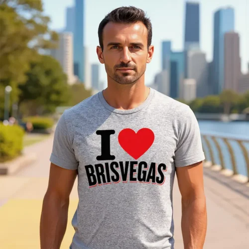 Man wearing an I Love Brisvagas men’s grey marle t-shirt by the Brisbane River