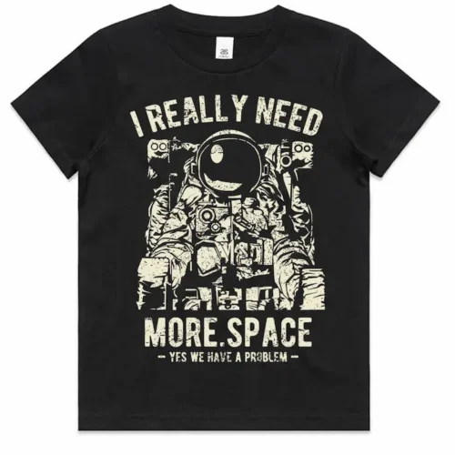 Black I Really Need More Space Kids T Shirt laid flat showing the front design