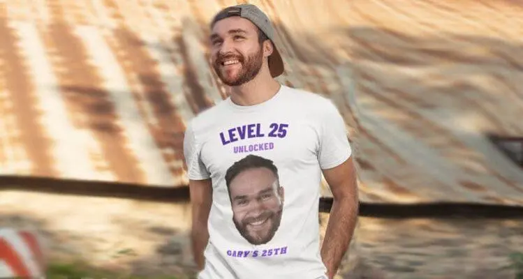 Man wearing a personalised birthday t shirt with a photo and Level 25 birthday design