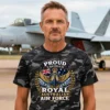 Man wearing a Dark Camo Royal Australian Air Force veteran-inspired t-shirt in front of a fighter jet