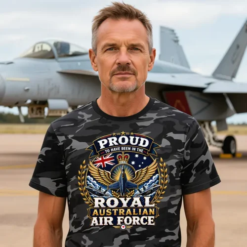 Man wearing a Dark Camo Royal Australian Air Force veteran-inspired t-shirt in front of a fighter jet
