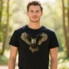 Man wearing a white Golden Owl men’s t-shirt standing in a forest