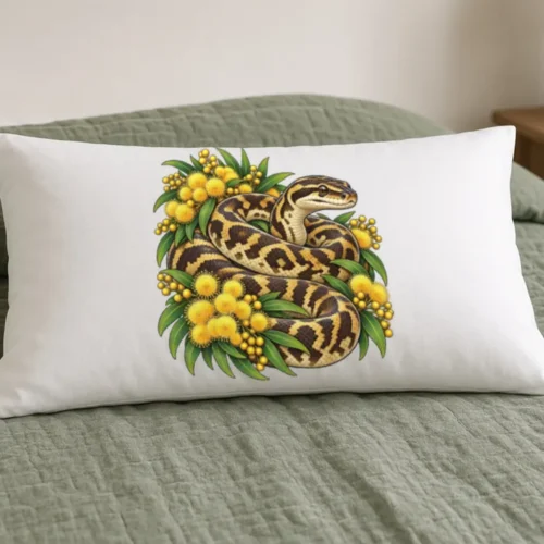 White Carpet Python Among Golden Wattle pillow case on a pillow on a bed with a sage green quilt