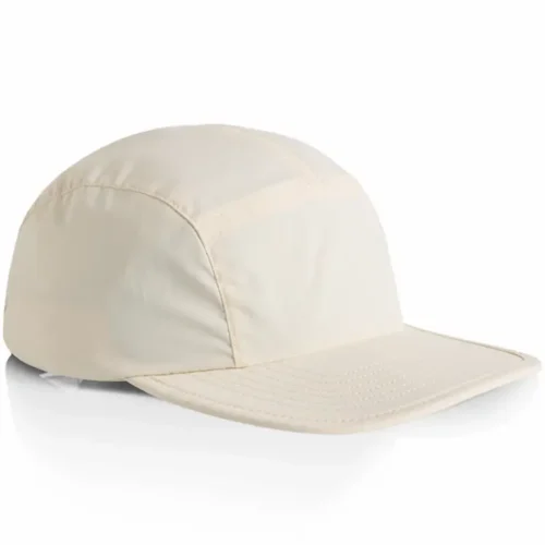 Side view of the Ecru AS Colour Finn Nylon Cap showing its low-profile crown, panel seams and flat peak
