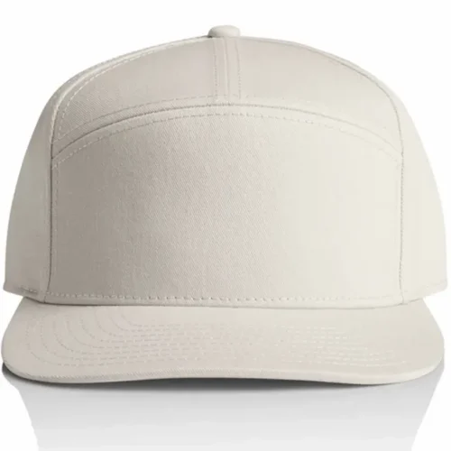 Front view of the Bone AS Colour Stock 7-Panel Cap 1184 showing the plain front panel and flat peak