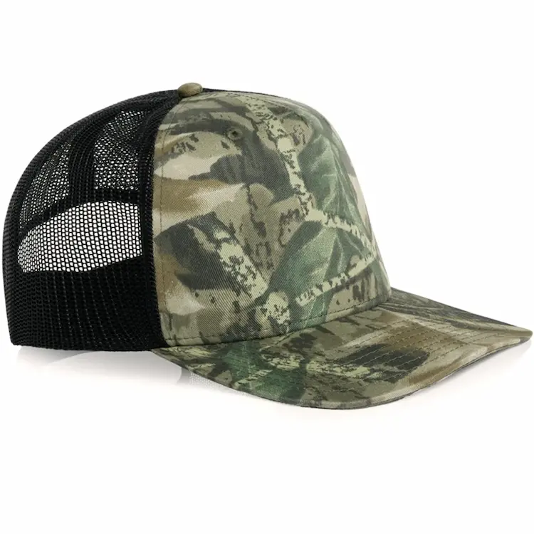 Angled side view of the AS Colour Stock Contrast Camo Trucker 1110C with a Tree Camo front and peak and black mesh back