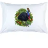 White pillow case printed with a cassowary among rainforest leaves