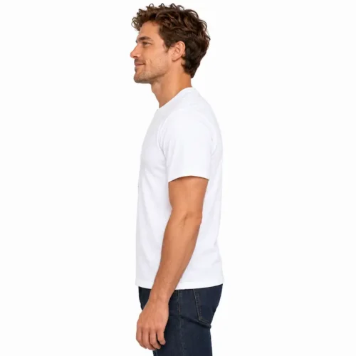 Left-facing side view of a man wearing a white Value Custom Unisex T Shirt and dark jeans.
